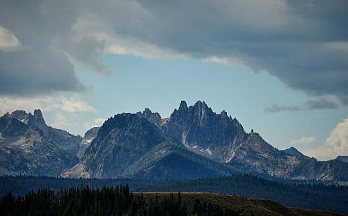 mountain rocky mountain near forest nature